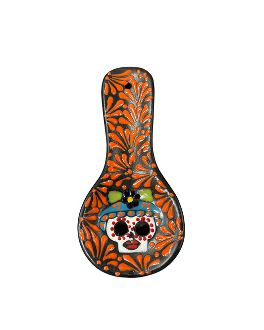 PORTA CUCHARA CALAVERA  BLACK CON ESPIGA ORANGE (CALAVERA MAY VARY)